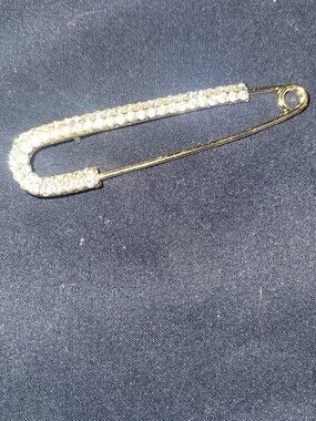 Goldtone crystal pin